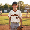 Custom Cream - Black - Orange - Old Gold Classic Trim Baseball Jersey – youth size worn by a kid