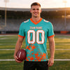 Custom Aqua - White - Orange Graphic Splash Pattern Football Jersey – worn by a man