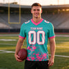 Custom Aqua - White - Pink Graphic Splash Pattern Football Jersey – worn by a man