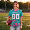 Custom Aqua - White - Pink Graphic Splash Pattern Football Jersey – worn by a woman