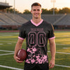 Custom Black - Light Pink Graphic Splash Pattern Football Jersey – worn by a man