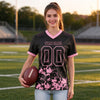 Custom Black - Light Pink Graphic Splash Pattern Football Jersey – worn by a woman