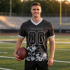 Custom Black - Silver Graphic Splash Pattern Football Jersey – worn by a man