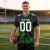 Custom Black - White - Grass Green Graphic Splash Pattern Football Jersey – worn by a man