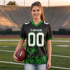 Custom Black - White - Grass Green Graphic Splash Pattern Football Jersey – worn by a woman