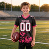 Custom Black - White - Neon Pink Graphic Splash Pattern Football Jersey – youth size worn by a kid