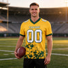 Custom Gold - White - Green Graphic Splash Pattern Football Jersey – worn by a man