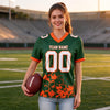 Custom Green - White - Orange Graphic Splash Pattern Football Jersey – worn by a woman