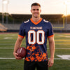 Custom Navy - White - Orange Graphic Splash Pattern Football Jersey – worn by a man