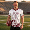 Custom White - Burgundy Graphic Splash Pattern Football Jersey – worn by a man