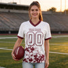 Custom White - Burgundy Graphic Splash Pattern Football Jersey – worn by a woman