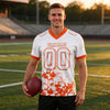 Custom White - Orange Graphic Splash Pattern Football Jersey – worn by a man