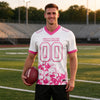 Custom White - Pink Graphic Splash Pattern Football Jersey – worn by a man