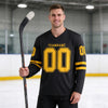 Custom Black - Gold Triple Stripes Hockey Jersey – worn by a man