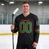 Custom Black - Kelly Green - Orange Triple Stripes Hockey Jersey – worn by a man