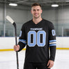 Custom Black - Light Blue - White Triple Stripes Hockey Jersey – worn by a man