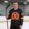 Custom Black - Orange - White Triple Stripes Hockey Jersey – worn by a man
