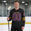 Custom Black - Gold - Purple Triple Stripes Hockey Jersey – worn by a man