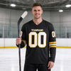 Custom Black - White - Gold Triple Stripes Hockey Jersey – worn by a man