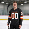 Custom Black - White - Orange Triple Stripes Hockey Jersey – worn by a man