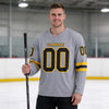 Custom Gray - Gold - Black Triple Stripes Hockey Jersey – worn by a man
