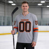 Custom Gray - Black - Orange Triple Stripes Hockey Jersey – worn by a man
