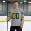 Custom Gray - Gold - Green Triple Stripes Hockey Jersey – worn by a man
