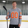 Custom Gray - Orange - White Triple Stripes Hockey Jersey – worn by a man