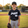 Custom Pinstripe Baseball Jersey – Black Royal Blue White – youth size worn by a kid