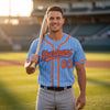 Custom Pinstripe Baseball Jersey – Light Blue Orange Royal Blue – worn by a man