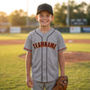 Custom Gray - Black - Orange - Old Gold Piped Baseball Jersey – youth size worn by a kid