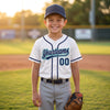 Custom Piped Baseball Jersey – White Navy Blue Teal – youth size worn by a kid