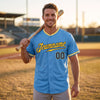 Custom Solid Baseball Jersey – Light Blue Navy Blue Gold – worn by a man